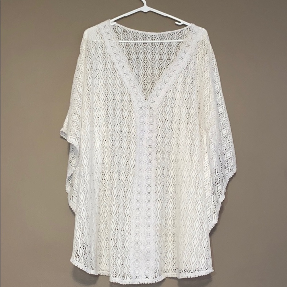 A White Crochet Swimsuit Coverup